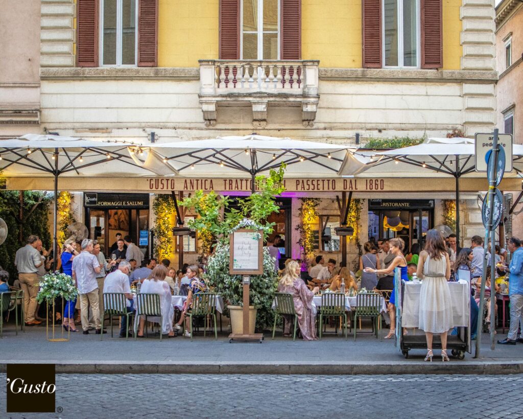 Lively Italian restaurant on a busy street.