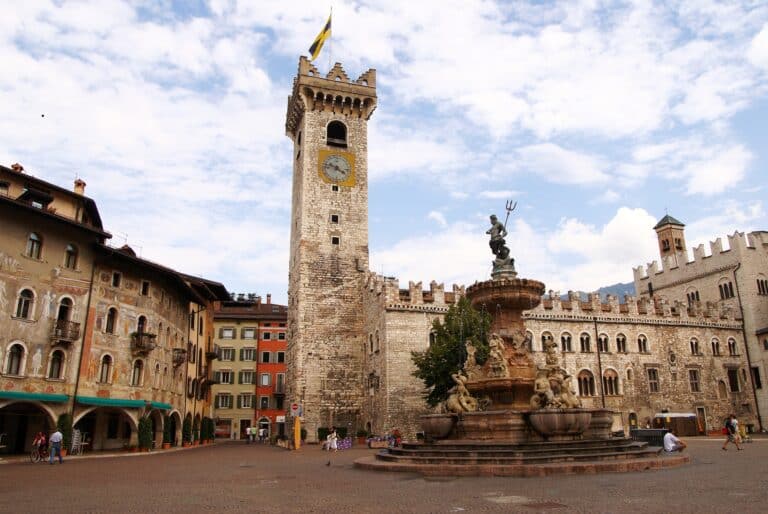 Piazza Duomo, Trento with fountain and historic tower.