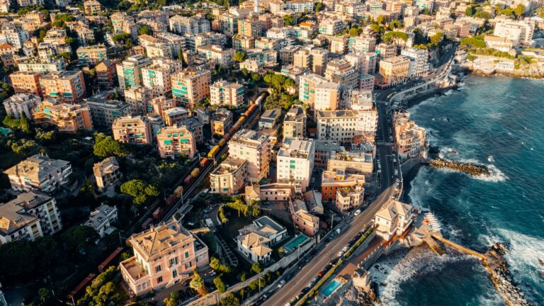 Aerial view over coast of Liguria, beach in Quarto dei Mille by Genova, Italy.