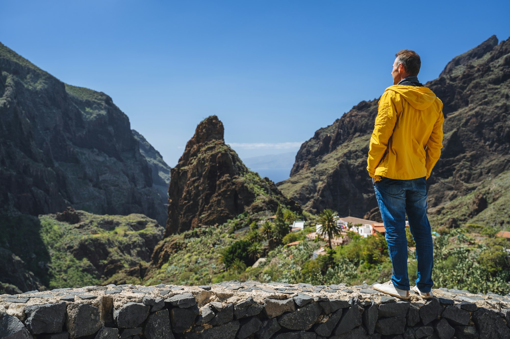 Masca Canyon in the mountain municipality in Tenerife, Canary Islands. Tourist man middle aged