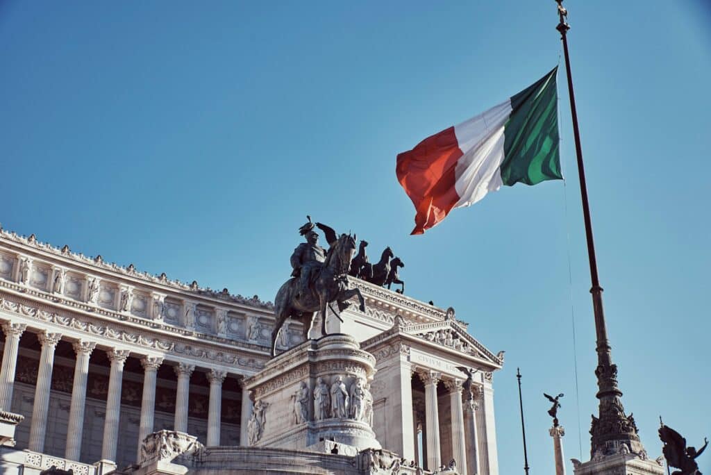 Monument to the homeland with the official flag of the Italian country