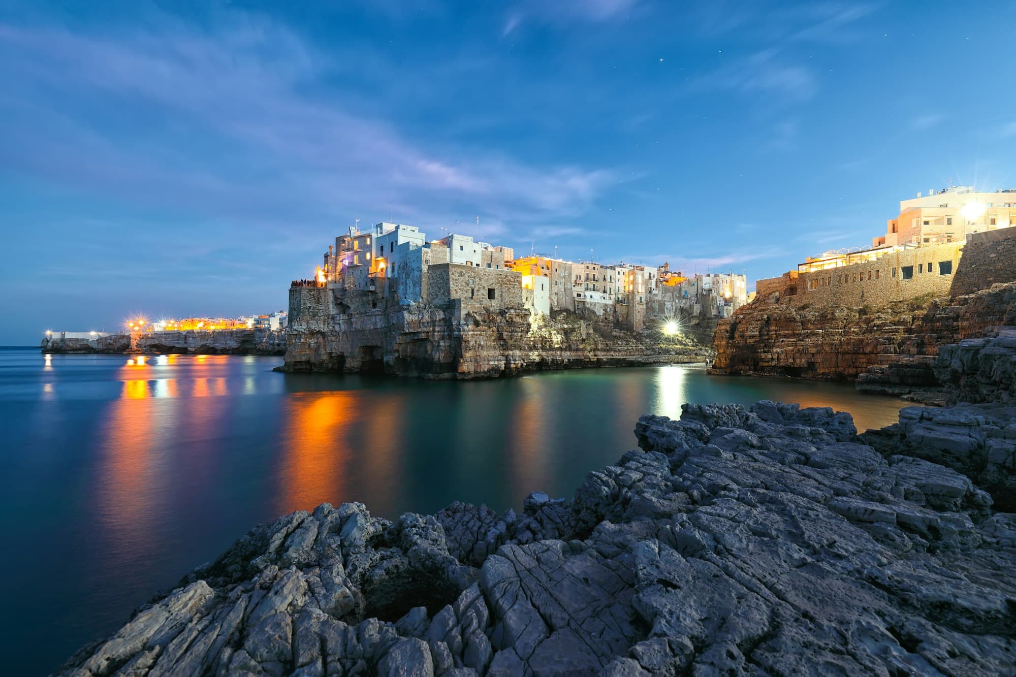 Night scene in the bay of Cala Paura in Polignano a Mare