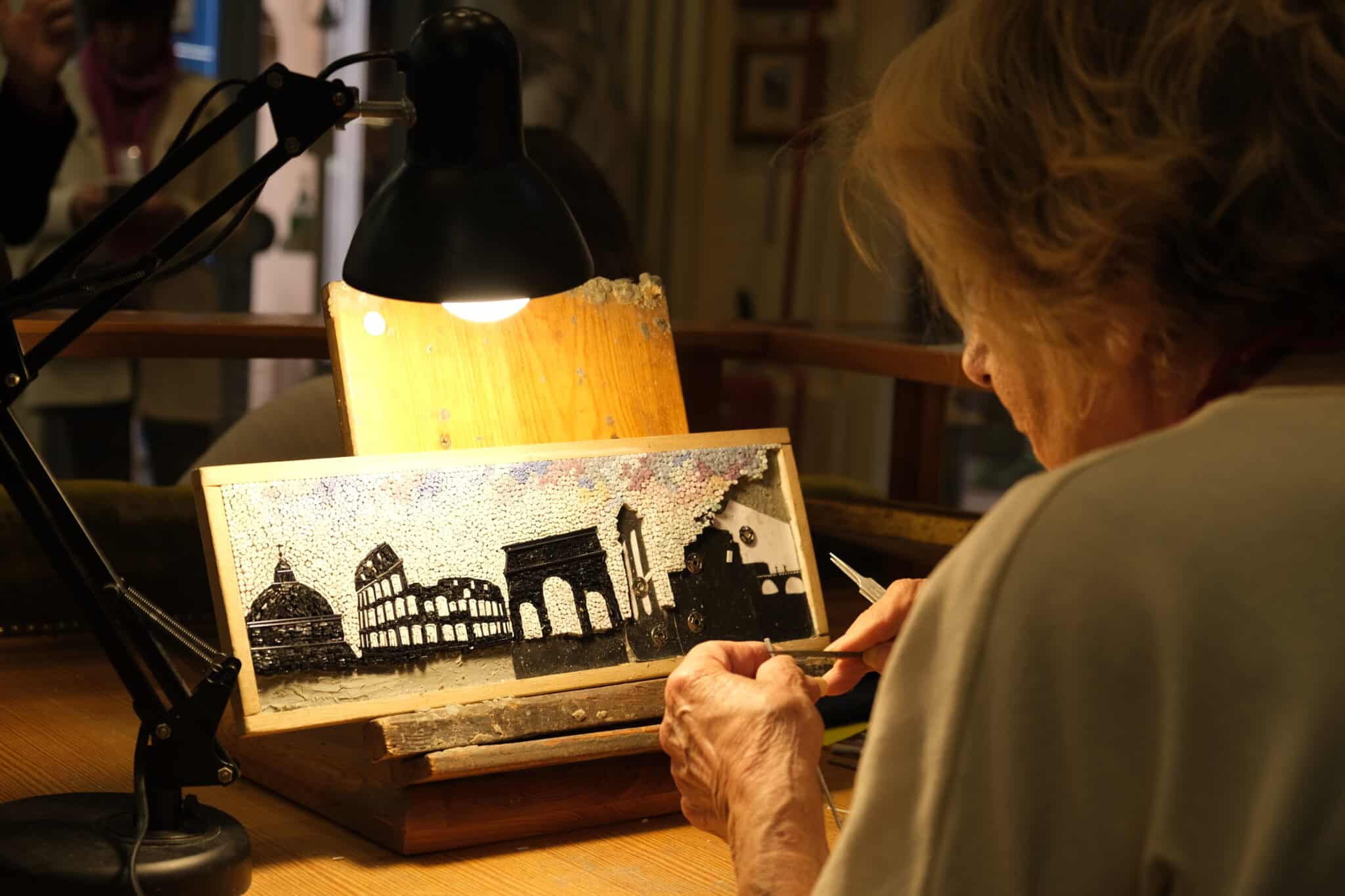 Mosaicist Maria Teresa Vacchini in the Savelli Studio.