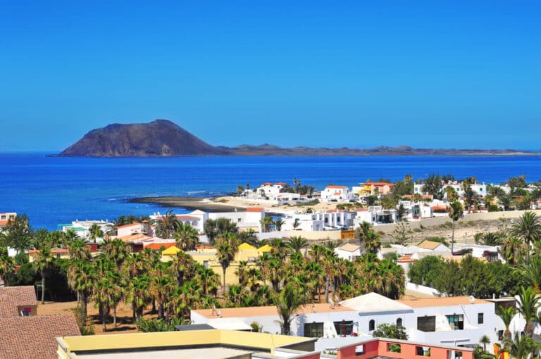 Lobos Island and Corralejo in Fuerteventura, Spain. A view of the island of Lobos from Corralejo in Fuerteventura, Canary Islands, Spain