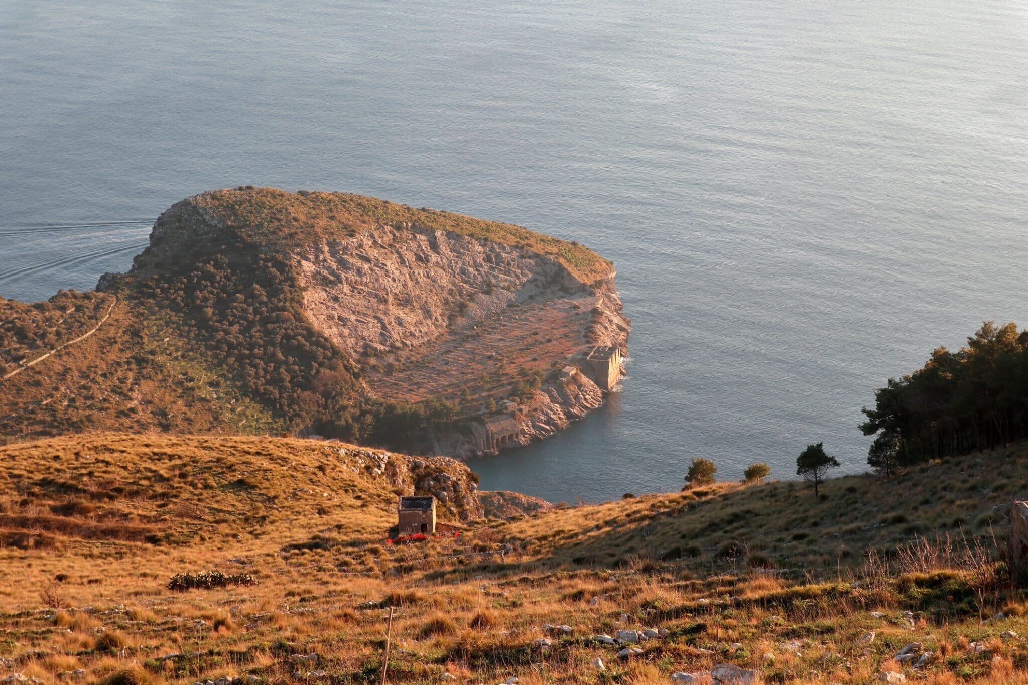 Rocky cliff lit by the setting sun